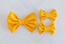 Load image into Gallery viewer, Weather Warriors Yellow Bamboo Alligator Clip Bows
